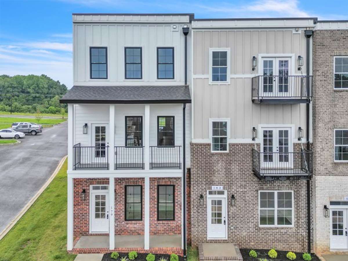 Welcome to 179 Charleston Ave! Coveted END unit with covered porch and 2 additional decks!
