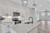 This floor is dedicated to entertaining & family time. It includes the spacious, well planned kitchen which flows into a dedicated dining area and then open living space all accepted by 10 ft high ceilings & recessed lighting.