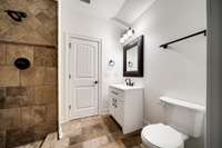 Walk-through bathroom from guest room to hobby room.