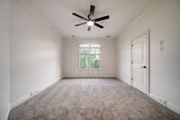 The fourth bedroom upstairs also has a bright window and access to full bath.
