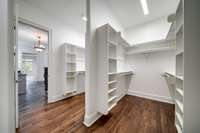 Freshly painted with hardwood flooring providing a move-in ready master closet!