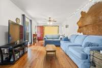 Large and open living room with great hardwood flooring....