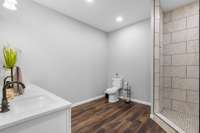 Continuing the theme... a Very large bathroom off of that room greets you