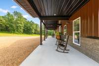 Massive covered porch on both ends of this building. Both offer stunning views...One captures wildlife and the other capture the motion of the sun and moon.