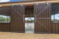 Step inside and we will look around... glide those barn doors all the way open.