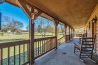 Beautiful front porch to enjoy your coffee! So peaceful!