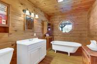 Bathroom with claw foot tub on main level.