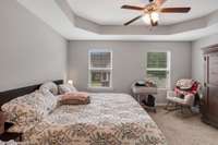 Spacious master suite with coved ceilings.