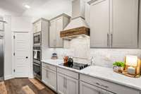 **PANTRY HAS CUSTOM DESIGNED SHELVING TO CREATE A WORKING PANTRY SPACE W/COUNTER & ELECTRIC FOR SMALL APPLIANCES.