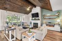 Living room w/12' slider leading to screened in porch.