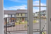 Adorable covered deck to enjoy your morning coffee. What a great space for the cook to grow a kitchen garden and feature seasonal flowers.