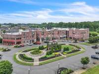 A great shot of the neighborhood shops of Pleasant View Village including your soon-to-be favorite restaurants...Guadalajara Mexican, Swezey's Pub, Twisted Fork, Flyte's Brewhouse, Chris' Pizza, Kuramoto Japanese & Street Coffee Coffee Bar.
