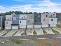 A nice look at these long private driveways, 2 car garages and unique features including large private guest balconies.