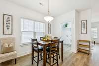 This space will easily hold a larger table!