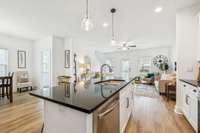 Food prep will be a breeze with spacious workspace, dishwasher & sink!