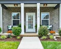Your family & friends will agree as they are welcomed by your cozy front porch...