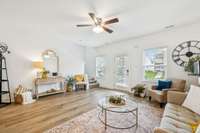 As the TV wall is so spacious, a faux fireplace would be easy to add with built-in bookcases for extra storage!
