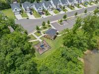 Aerial view of the playground area... Doggie stations throughout the community