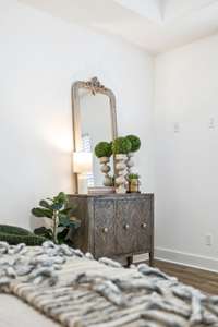 Note to the right of the dresser....1 of 2 locations for a mounted TV in Primary BR!