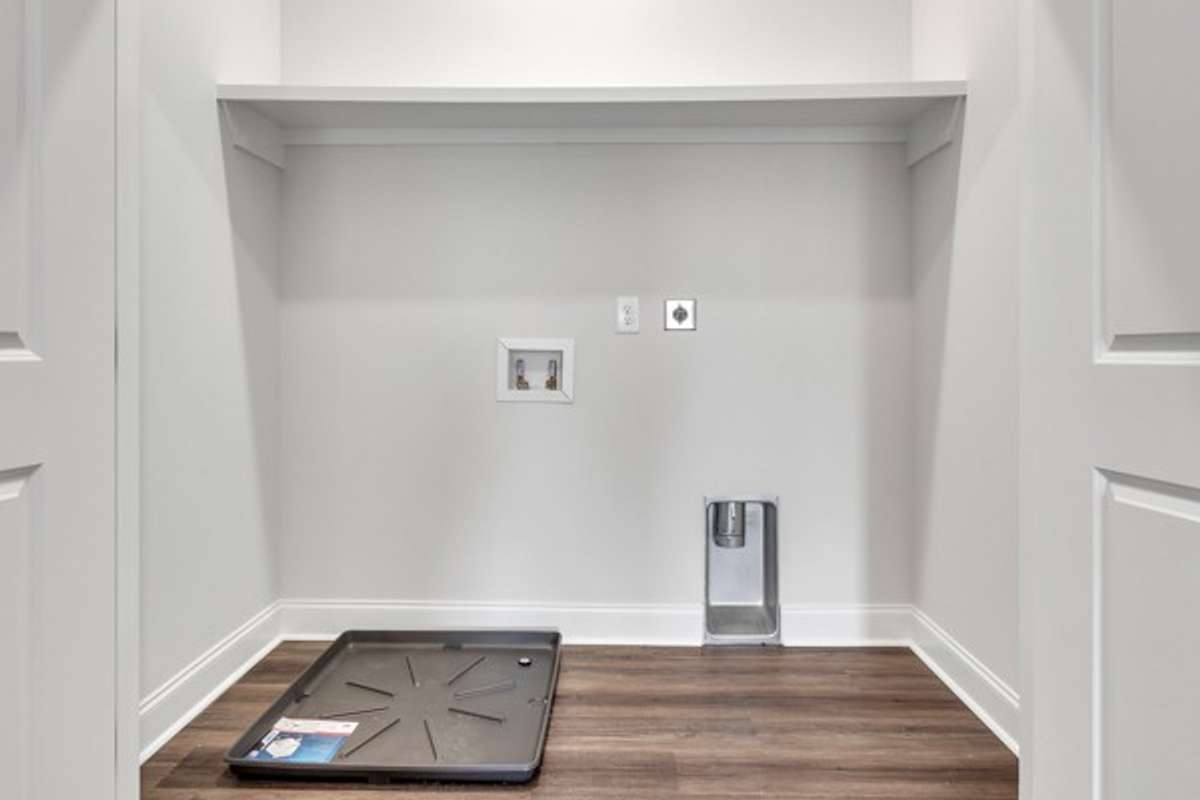 Laundry area located near 2 of the 3 bedrooms.