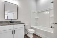 Full bathroom on the 2nd floor with modern decor, fixtures & lighting.