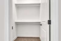 Spacious walk in closet for guest bedroom.