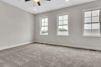 What a special feeling this large owner's retreat has with the high ceilings, multiple windows and perfect view over the top of this trendy neighborhood.