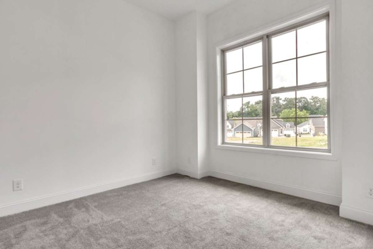Large 1st floor private guest room with 10 foot ceiling, modern ceiling fan recessed lighting.