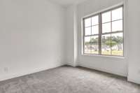 Large 1st floor private guest room with 10 foot ceiling, modern ceiling fan recessed lighting.