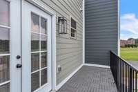 What a great area for guests to enjoy private time in the morning and evening. Another great view of the local neighborhood restaurants. Notice the added window to provide more light to the guest bath.