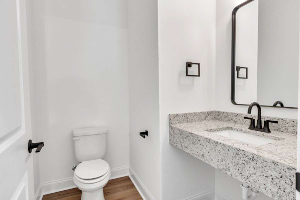 Half bath at top of the stairway as you enter the 2nd floor.