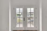 French doors to a perfect place to enjoy your morning coffee!