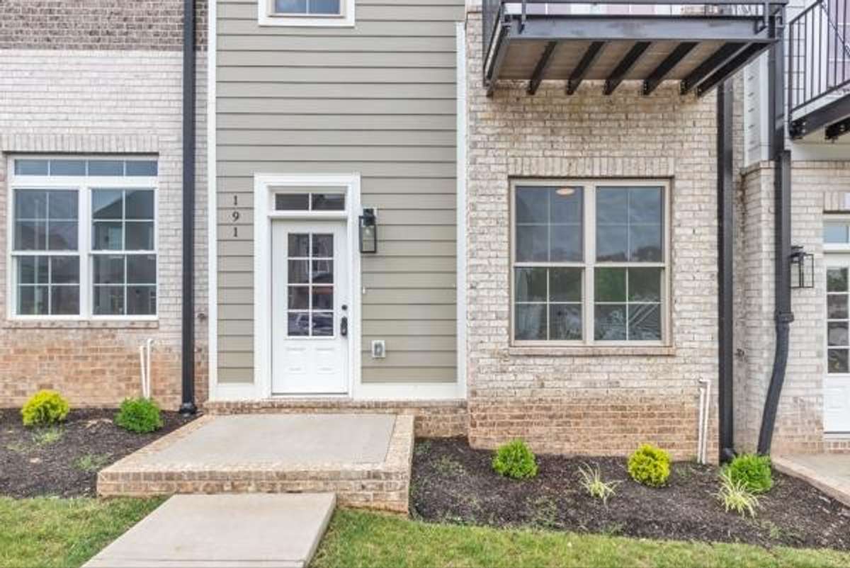 This front porch is just waiting for your seasonal decor!