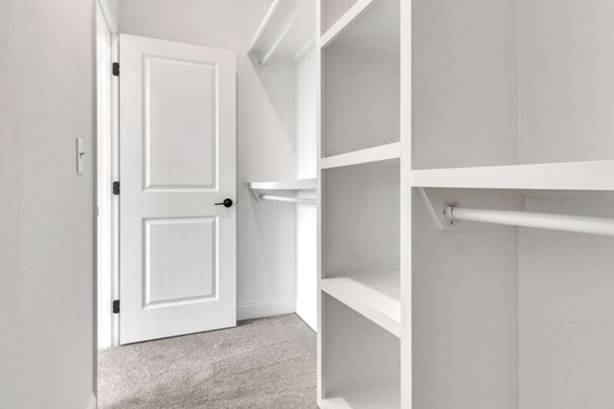 Another angle of owner's closet.