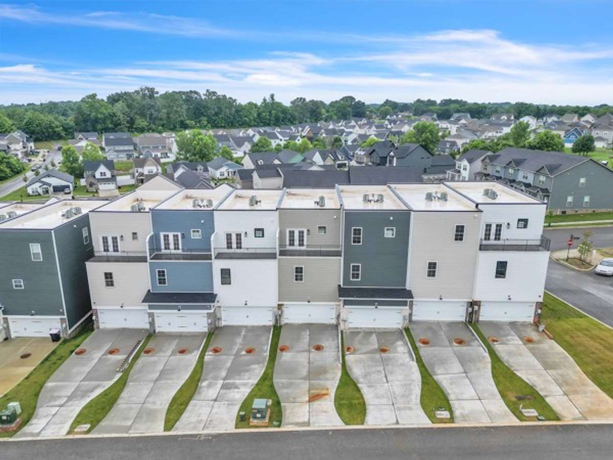 A nice look at these long private driveways, 2 car garages and unique features including large private guest balconies.