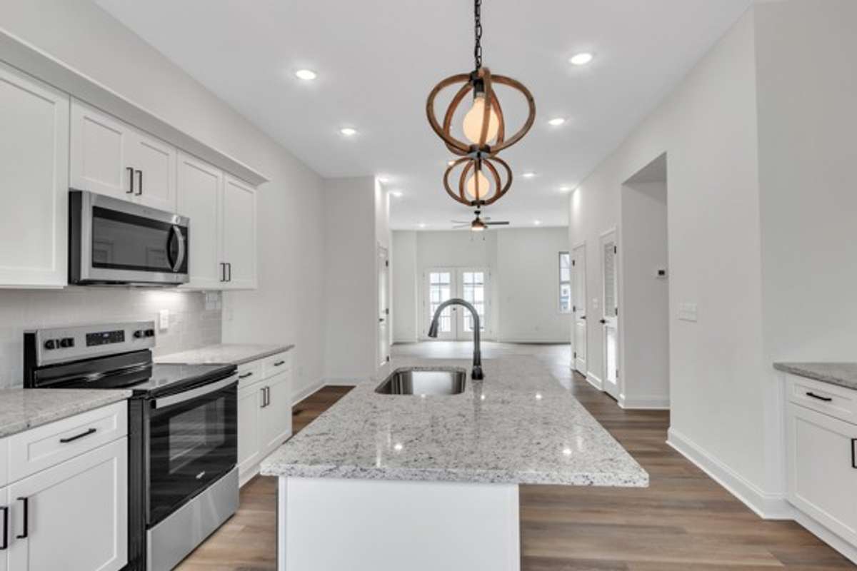 This floor is dedicated to entertaining & family time. It includes the spacious, well planned kitchen which flows into a dedicated dining area and then open living space all accented by 10 ft high ceilings & recessed lighting.
