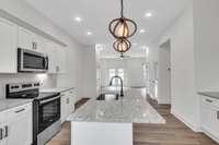 This floor is dedicated to entertaining & family time. It includes the spacious, well planned kitchen which flows into a dedicated dining area and then open living space all accented by 10 ft high ceilings & recessed lighting.