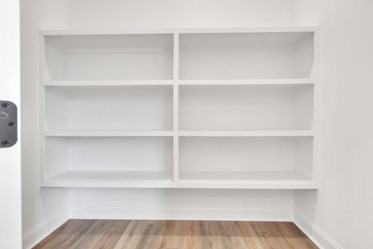Deep pantry conveniently located right off the kitchen