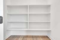 Deep pantry conveniently located right off the kitchen