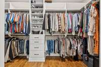 Extra large walk-in closet with built-in storage, making it hard to not be organized!
