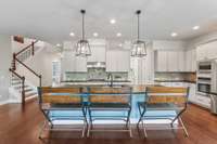 LARGE BAR WITH LEATHERED GRANITE COUNTERTOPS