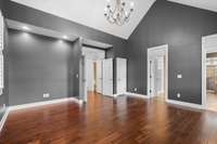 Primary bedroom on main level (vaulted ceilings)