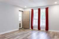 Living Room features pet door to screened in porch