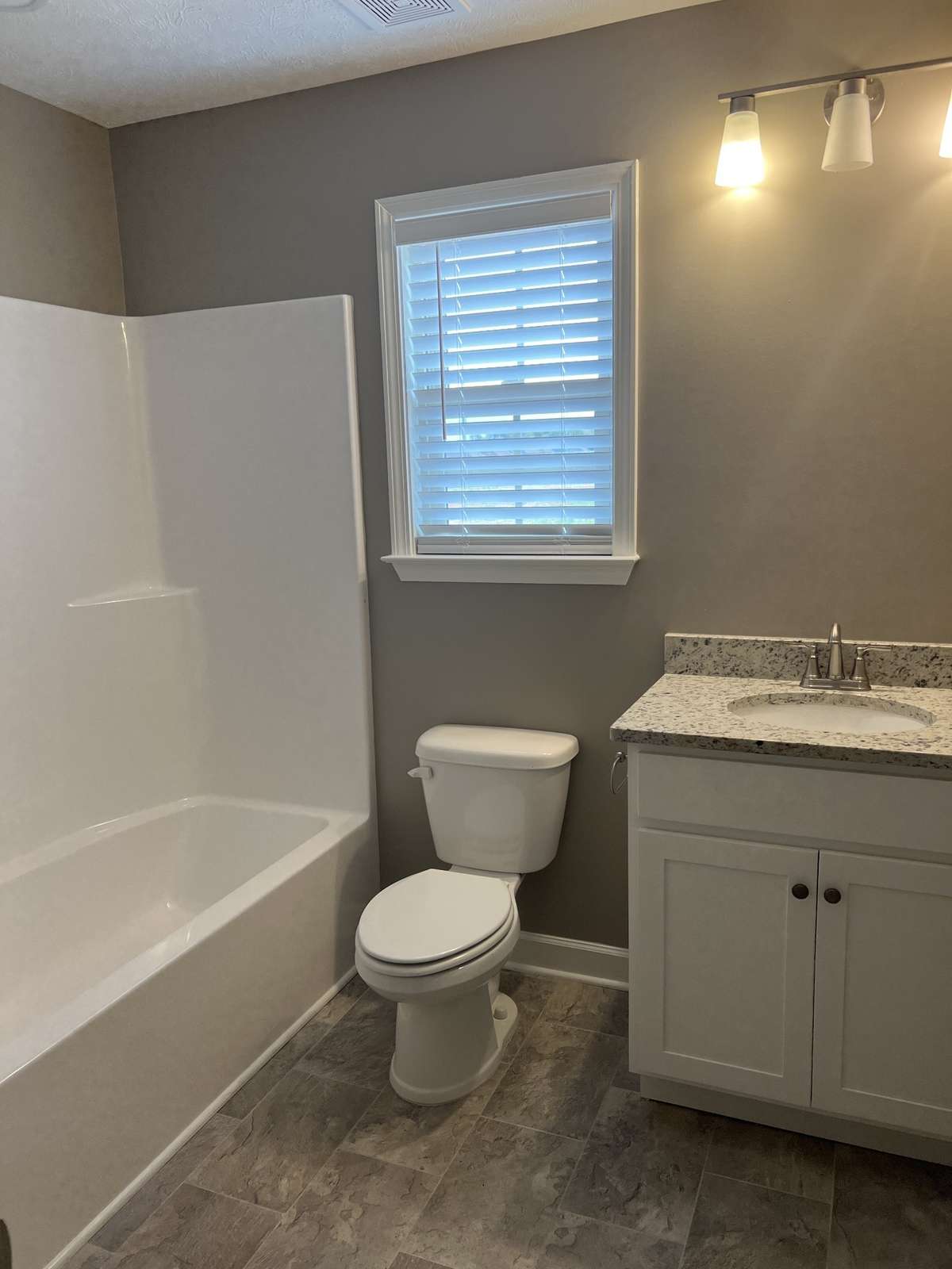 Photo of different home but same floor plan. Finishes will vary.