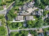 This expansive aerial perspective highlights the full scale of the property.