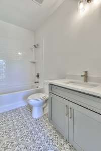 Secondary bathroom on main level.
