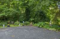 This unit is at the end of the drive with only 6 total units. Private. One of the neighbors has done a nice garden.