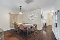 The dining room offers ample space to enjoy your meals. Complete with a breakfast nook, dining area, and spacious countertops.