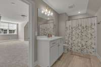 Connected private bathroom makes this the ideal space for guests, in-laws or teens.
