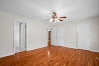 Two walk in closets and full bathroom in primary bedroom.